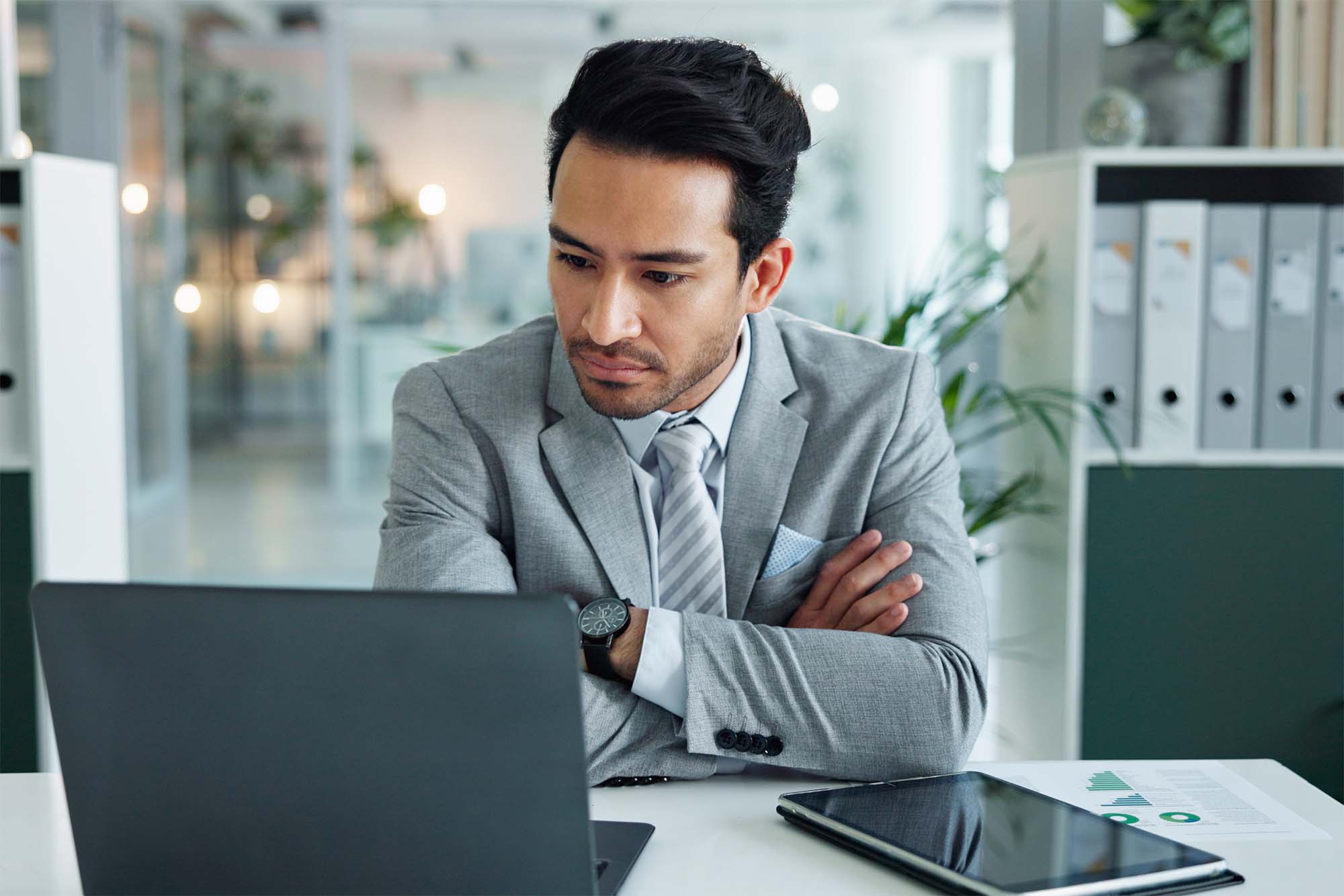 Investment CRM worker looking stressed due to bad CRM