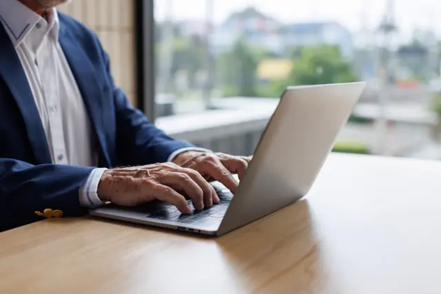 Fund manager reviewing secure white-labeled investor portal showing LP document access capital account statements and performance reports on investment CRM platform
