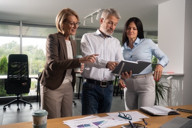 Investment firm managing director reviewing CRM dashboard showing LP pipeline health overdue follow-ups and fundraising progress metrics for weekly leadership review