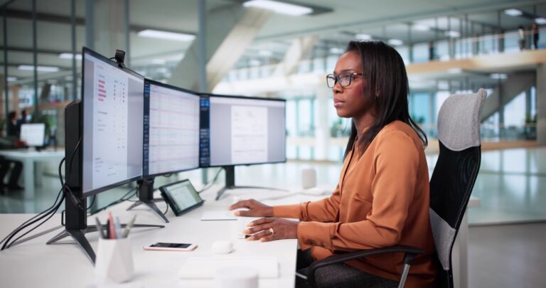 Asset management investor relations team reviewing comprehensive LP relationship record in SatuitCRM showing fund commitment history, compliance documentation, and activity log