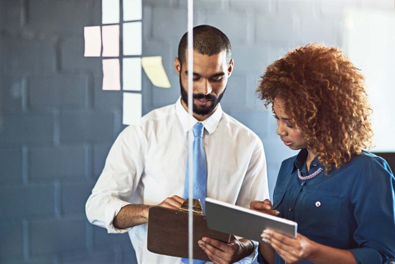 A side-by-side comparison chart of SatuitCRM and Navatar features for asset managers