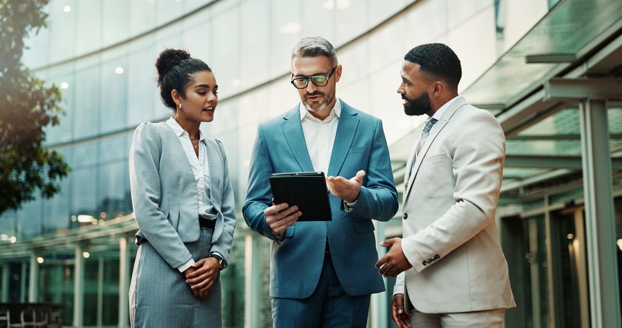IR professional presenting a business case for an investment CRM upgrade to firm leadership