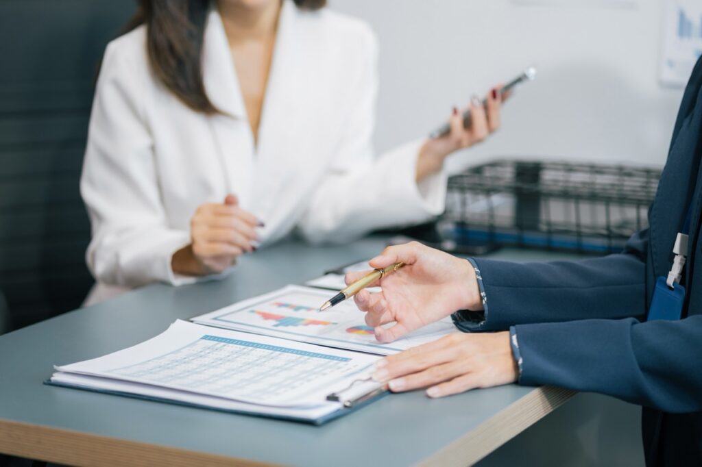 Investment firm leadership reviewing realistic CRM implementation expectations before a purchase decision
