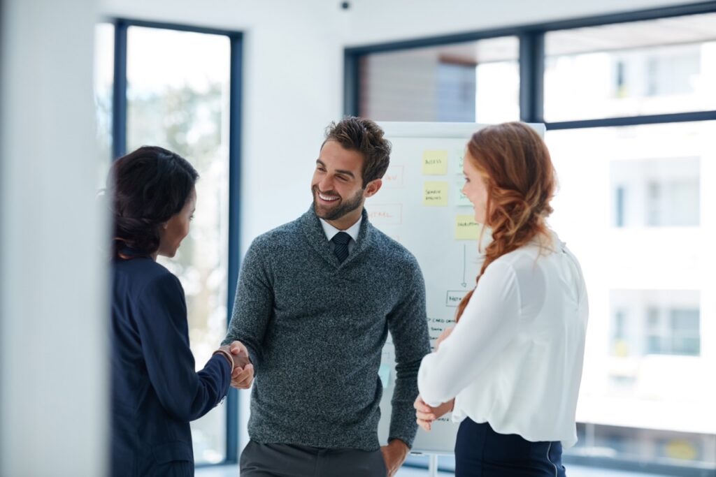 Investment management team reviewing an AI-driven CRM dashboard