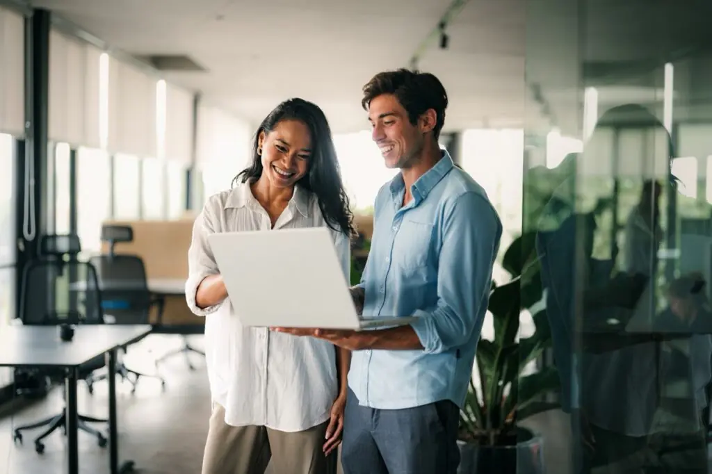 Investment office team using a CRM for endowments and foundations on a tablet